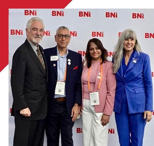 Dr. Ivan Misner, Mary Thompson, and BNI members at a BNI networking event.